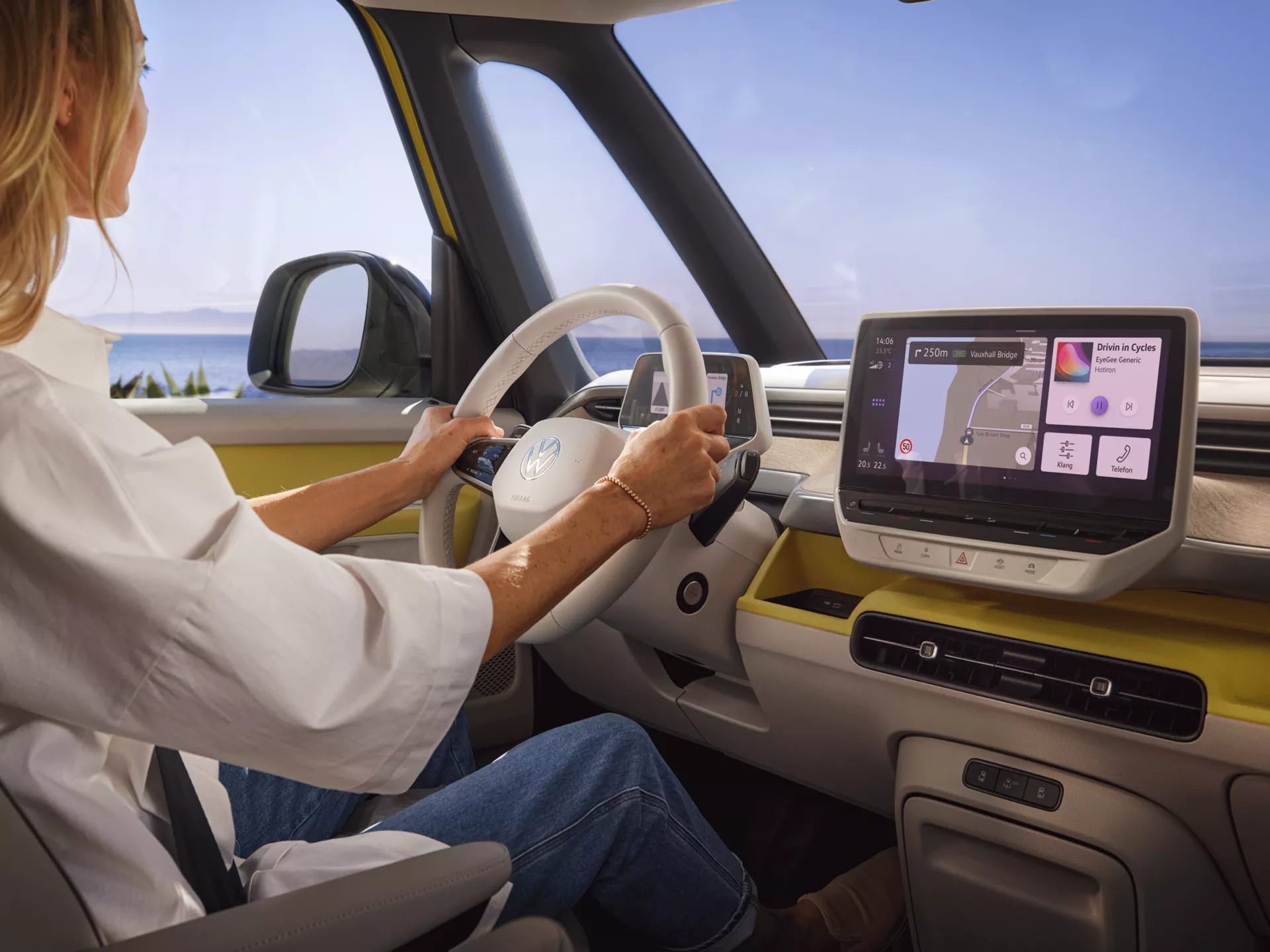 IB0178-id-buzz-interior-woman-sits-at-the-wheel